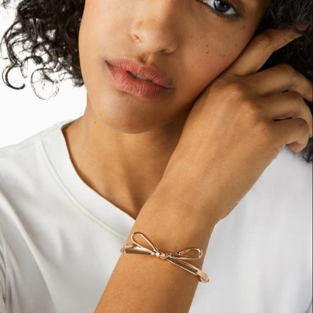Kate Spade Skinny Mini Bow Bangle Rose Gold Tone Bracelet - Picture 3 of 5